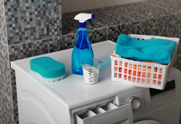 Tools for cleaning mold in a front-load washer.