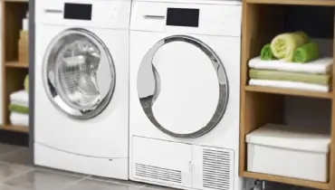 Front load washer and dryer in laundry room.